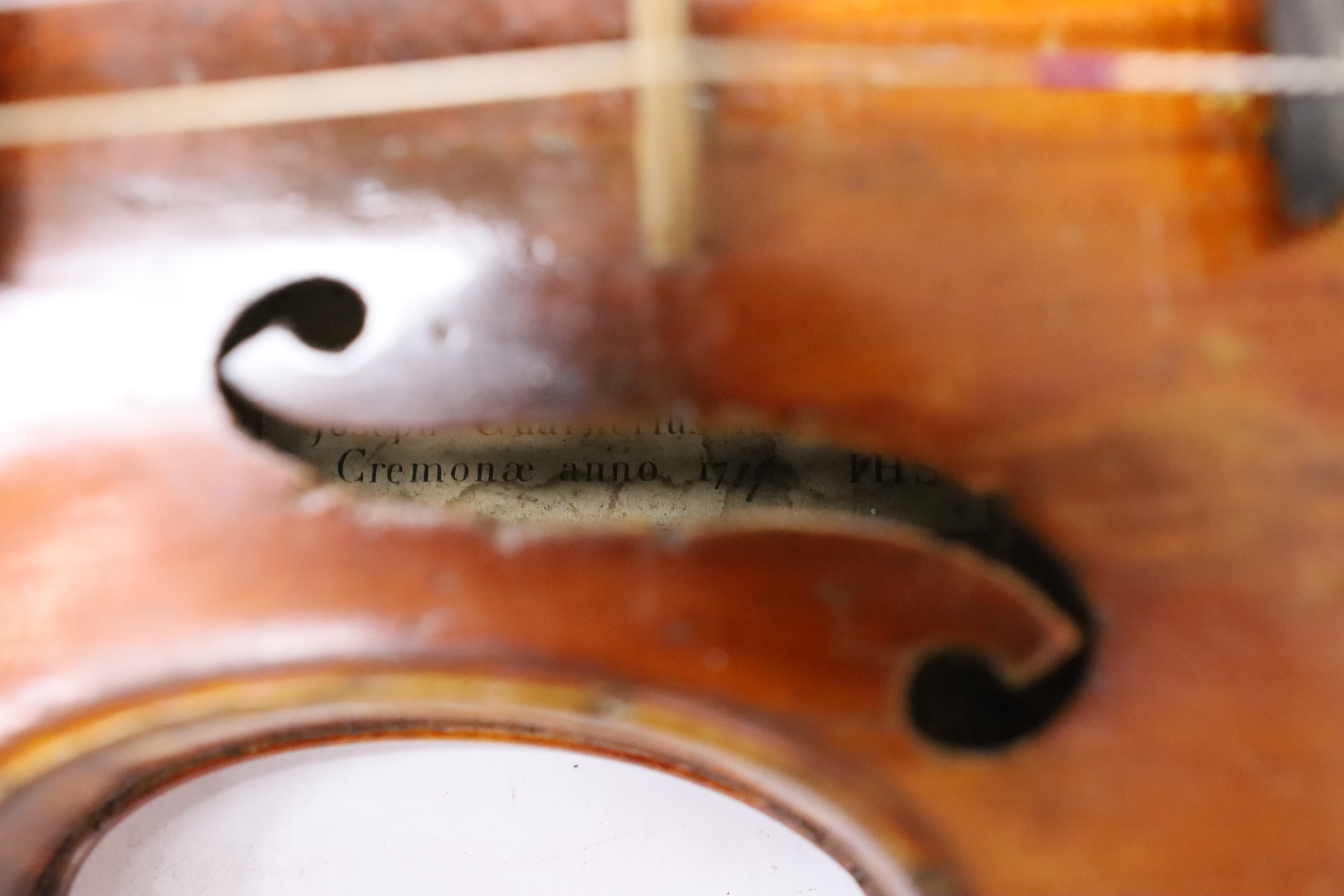 A cased late 19th/early 20th century French violin, bears Joseph Guarnerius label